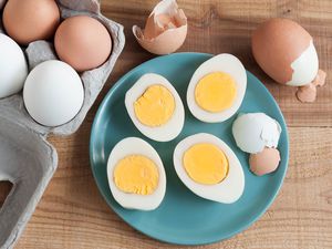 Peeled and sliced Instant pot hard boiled eggs on a plate