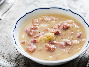 Ham and Potato Soup in a white bowl with blue trim