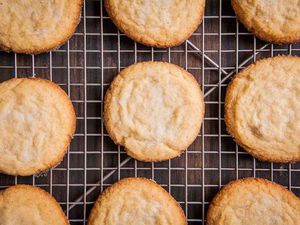 Soft and Chewy Sugar Cookies on Mesh Baking sheet