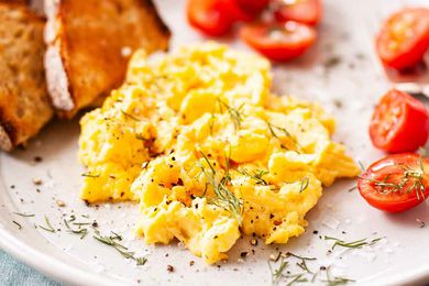 Easy Scrambled Eggs with toast on a plate