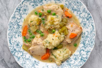 Dumplings recipe ladled in a bowl.