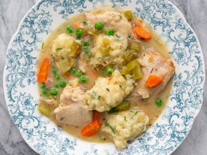 Dumplings recipe ladled in a bowl.