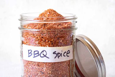 Rib rub recipe in a jar with a bbq spice label on jar