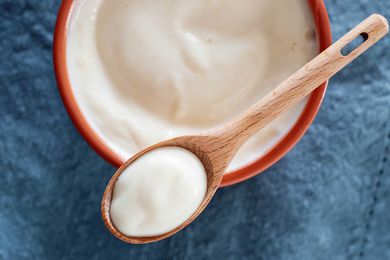 homemade mayo on a wooden spoon