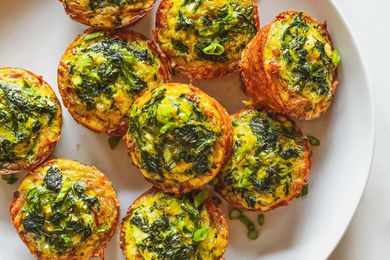 Top view of easy hash brown egg bites on a white plate.