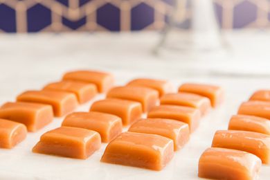 Homemade Caramel Candy cut into squares.