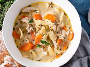 A bowl of creamy chicken noodle soup