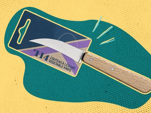 French knife with a blue and yellow illustrated background