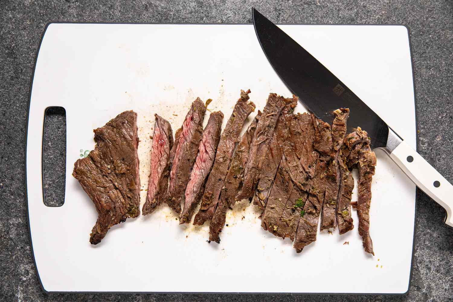 Arrachera (Mexican Skirt Steak) Cut Into Slices on a Cutting Board