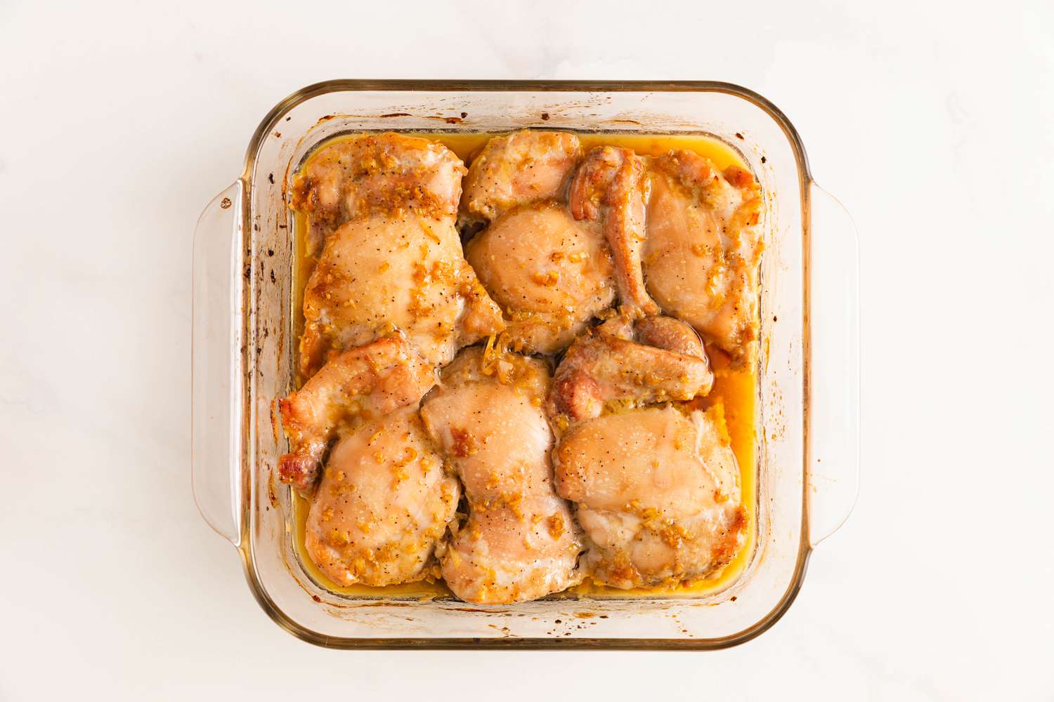 Baked chicken in a glass Pyrex dish for banh mi salad recipe 