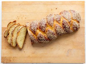 sliced challah on cutting board