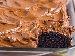 Baking Pan of Chocolate Mayonnaise Sheet Cake with a Slice Cut Out
