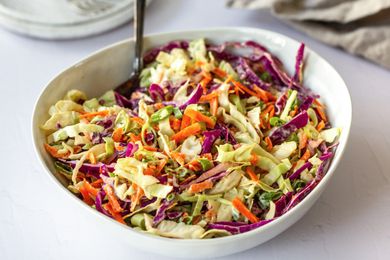 Bright and fresh Classic Coleslaw in a white bowl.