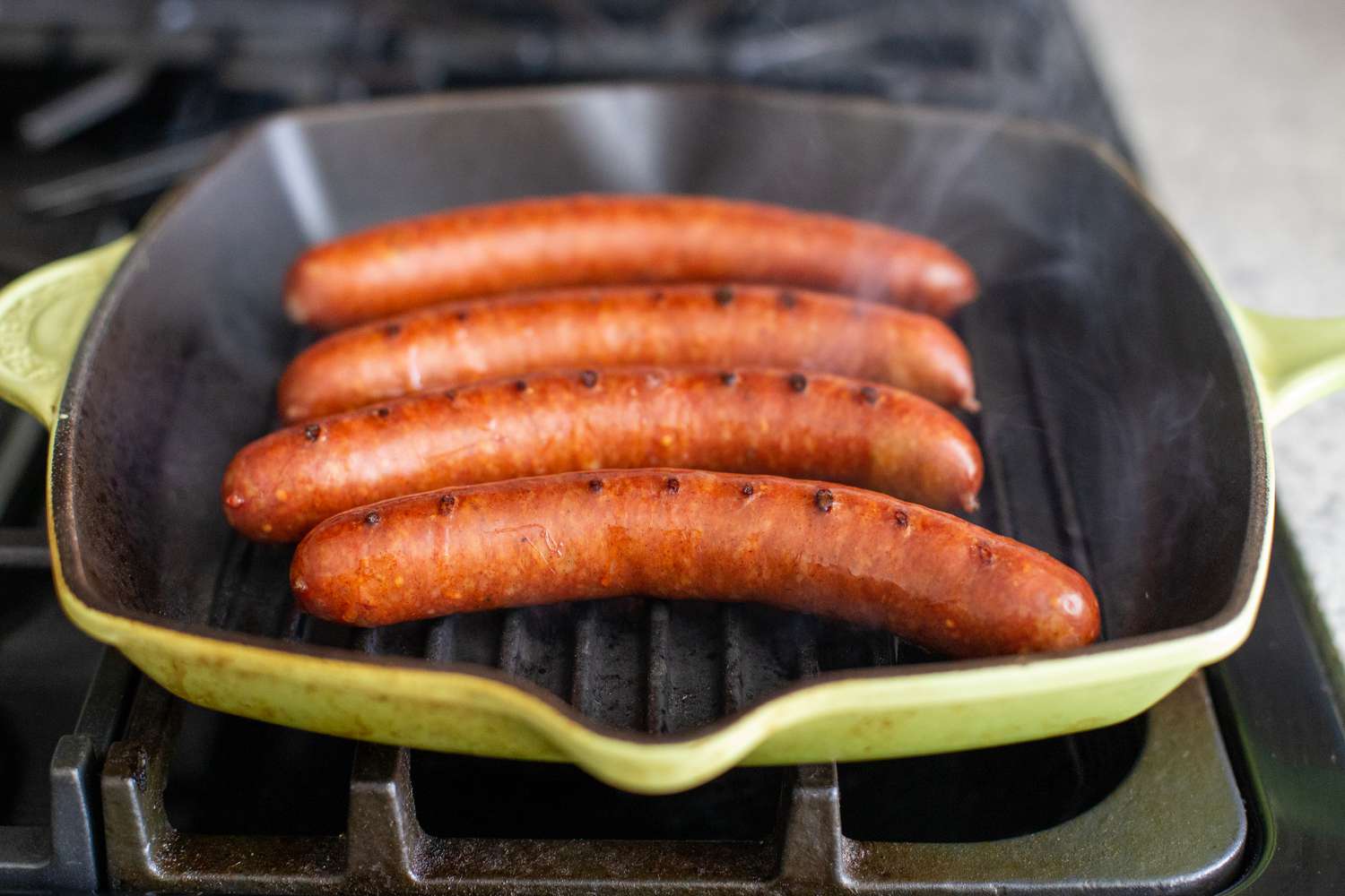 Pork Links Cooking on the Grill Pan (Pork Links Now Have Grill Marks)