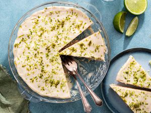 Easy lime icebox cake with two slices taken out on a blue plate with forks