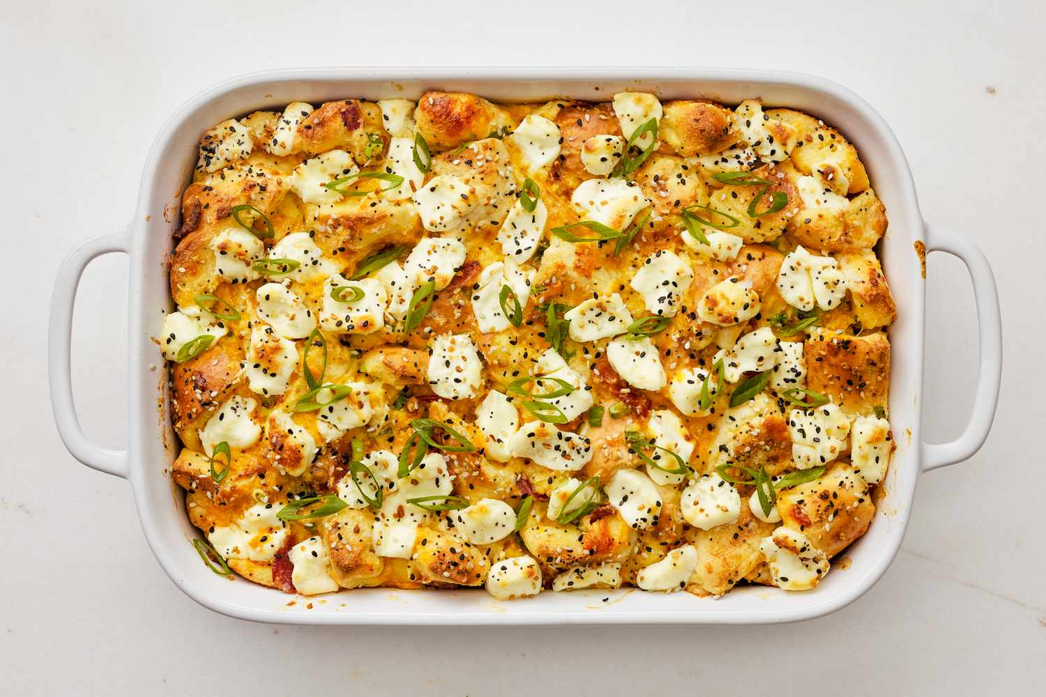 Everything bagel sandwich casserole (baked) in a casserole dish