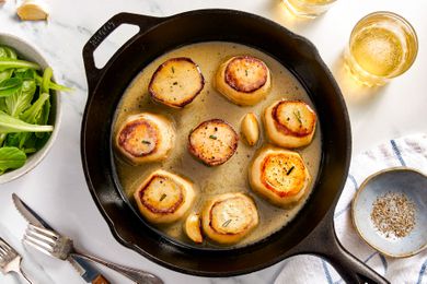 A skillet of fondant potatoes, ready to serve