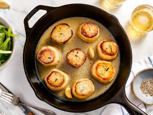 A skillet of fondant potatoes, ready to serve