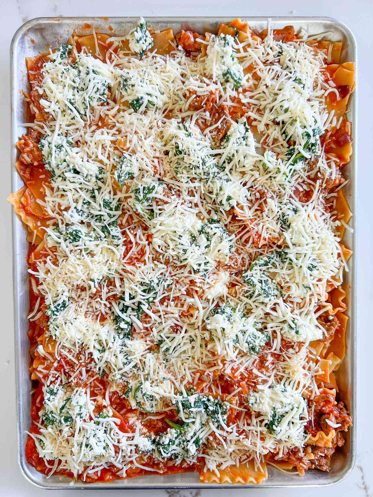 Sheet pan lasagna before being baked