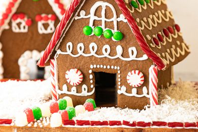 Side view of the front of a house made of gingerbread.