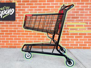 Photo of a shopping cart on the side walk with photo illustrations outlining the shopping cart