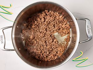 Photo of cooked ground beef with some illustrations on the corners 