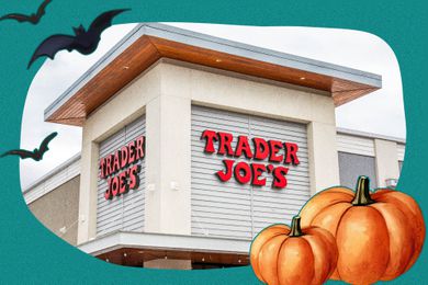 Photo of a Trader Joe's storefront with Halloween illustrations on top of it (illustrations of bats and pumpkins