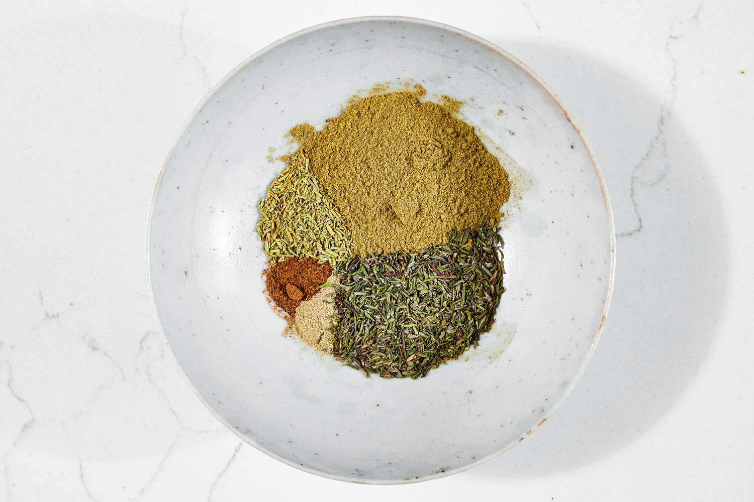 In a Bowl, Piles of Spices for Poultry Seasoning