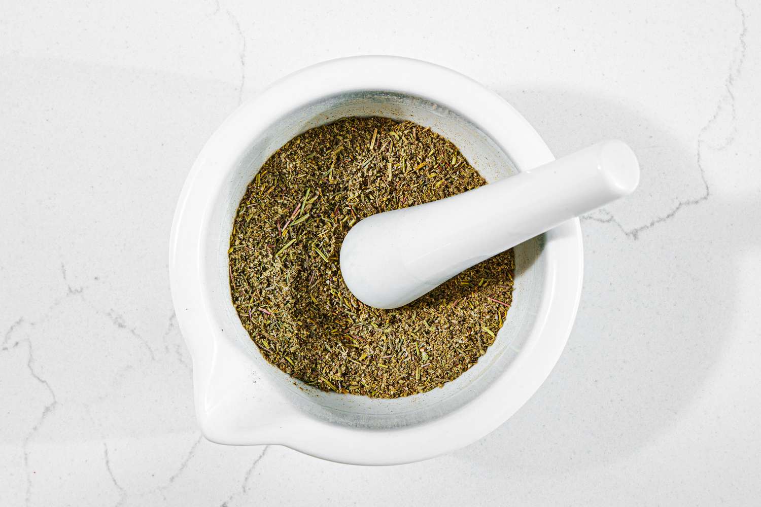 Poultry Seasoning Grinded in a Mortar and Pestle