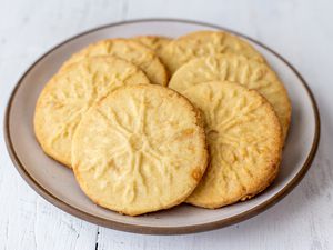 Overhead view of a plate of almond shortbread cookies