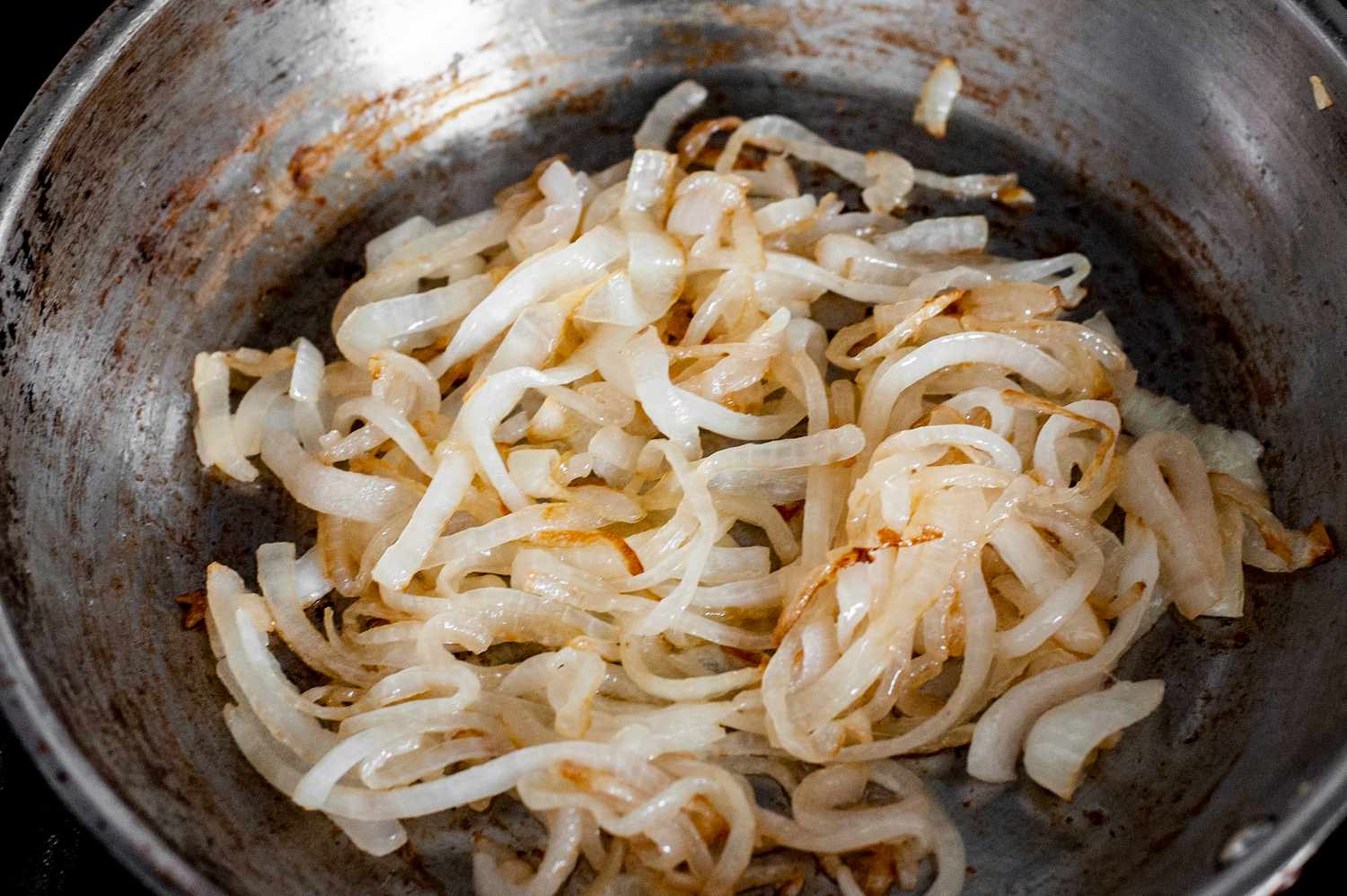 Caramelized Onions in a Skillet for How to Make a Vegan Patty Melt