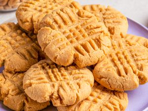 Peanut butter cookies on a purple plate