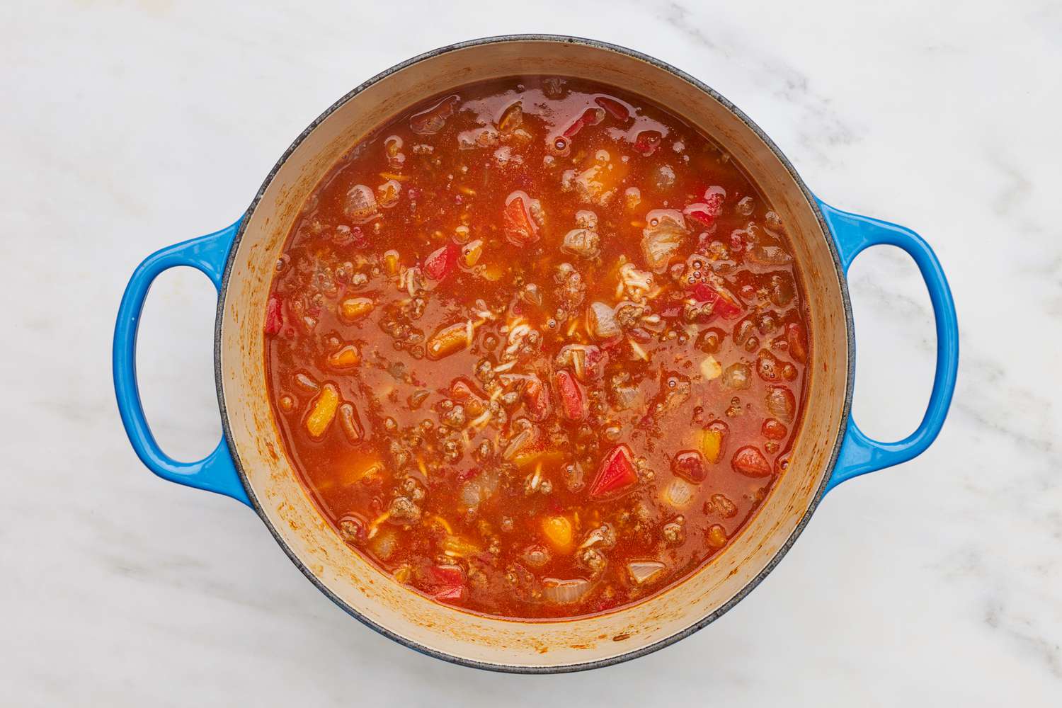 Cooked stuffed pepper soup in a dutch oven