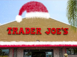 Trader Joe's store front with a santa hat and snow illustrations