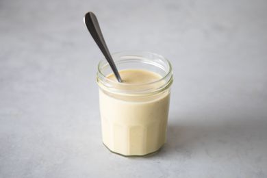 Jar of vegan caesar dressing