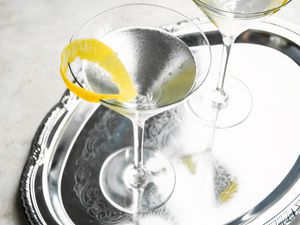 Two Glasses of Vesper Cocktail on a Silver Tray