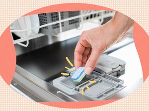 Dishwasher detergent tablet placed in the dishwasher's dispenser 